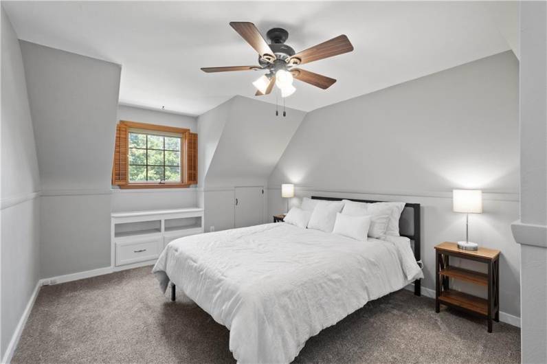 Comfy and cozy is the best way to describe this bedroom with so much charm.