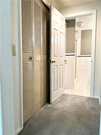Large Closets On Both Sides Of Hallway