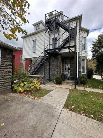 Rear of building access to 3rd level apt.