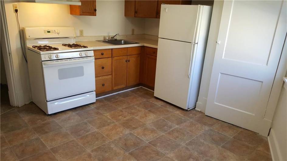Large eat-in kitchen with pantry.