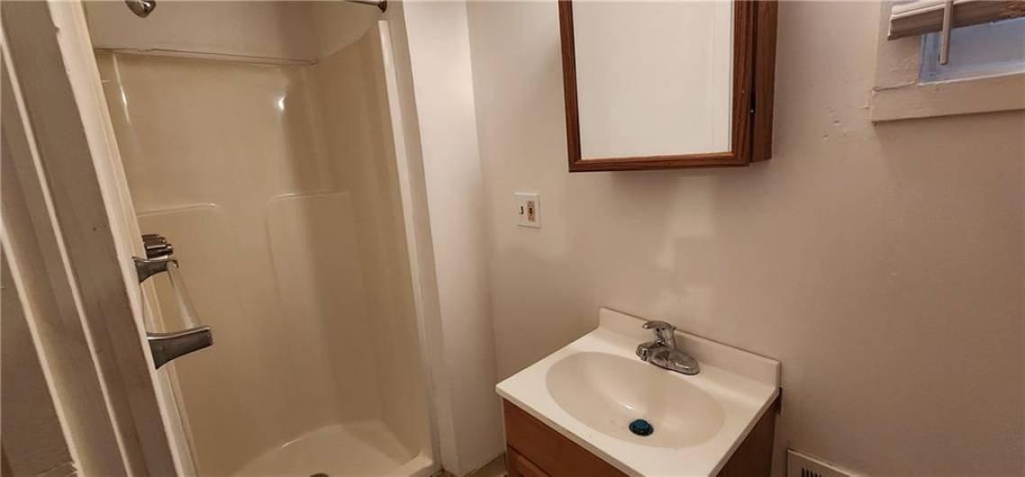 New vanity, faucet & commode.