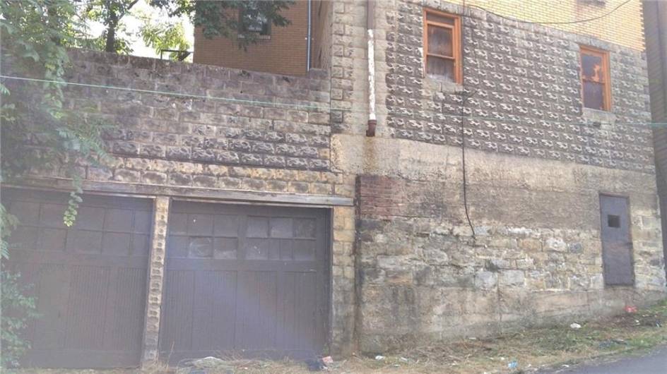 Two car garage. Currently rented for storage (30+ years) at nominal rate. Potential source for additional income !!