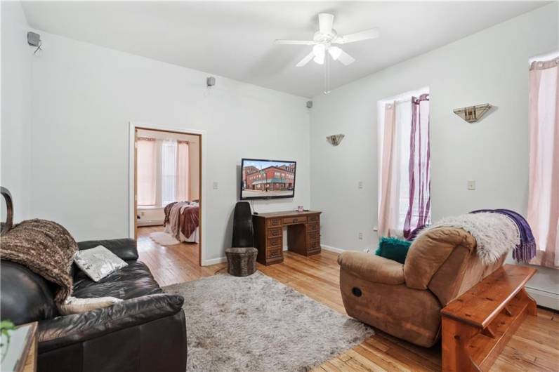 Beautiful HW floors flow throughout the living room...