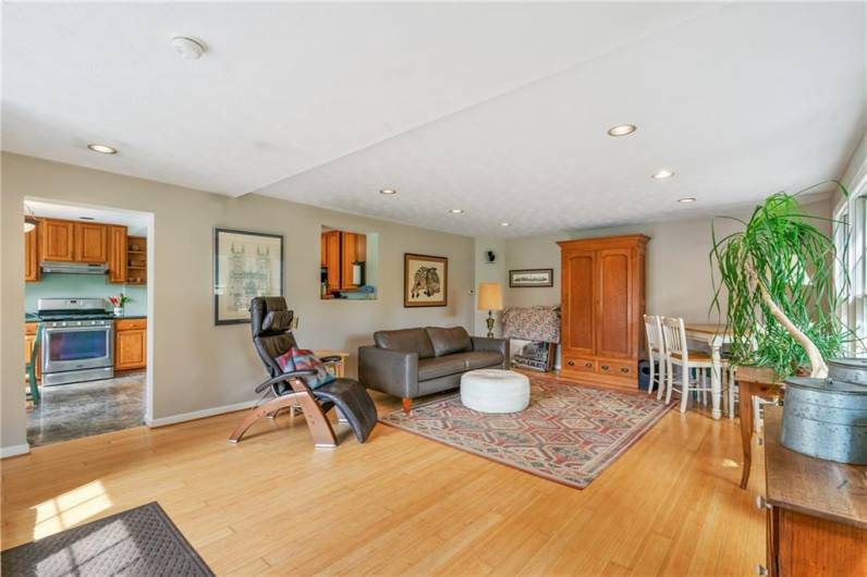 cut out above kitchen sink looks into the family room