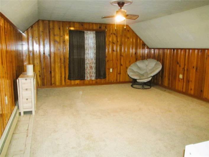 Master Bedroom has knotty pine paneling...