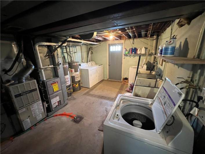 Shared Mechanical/ Laundry Room with Dedicated Laundry Machines