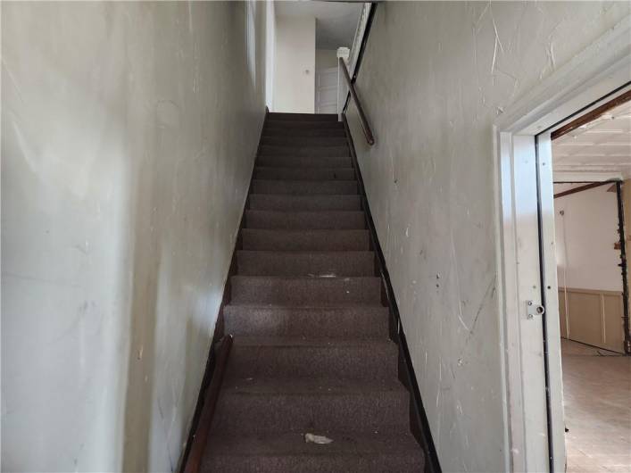 stairs to aupper apartment