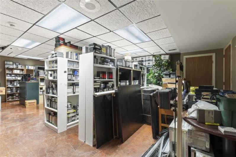 Huge basement used for storage but can easily be even more office space.  Bathroom and kitchen on this floor too!