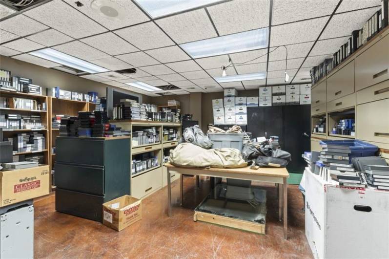 Huge basement used for storage but can easily be even more office space.  Bathroom and kitchen on this floor too!