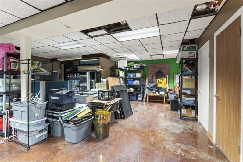 Huge basement used for storage but can easily be even more office space.  Bathroom and kitchen on this floor too!