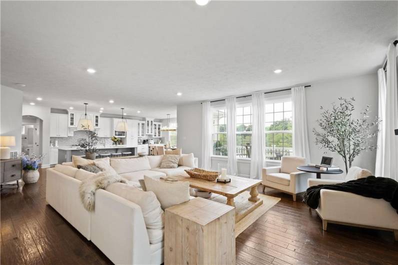 Large and open Family Room anchored by walls of windows.