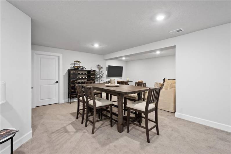 Large walk-out game room with full bath.