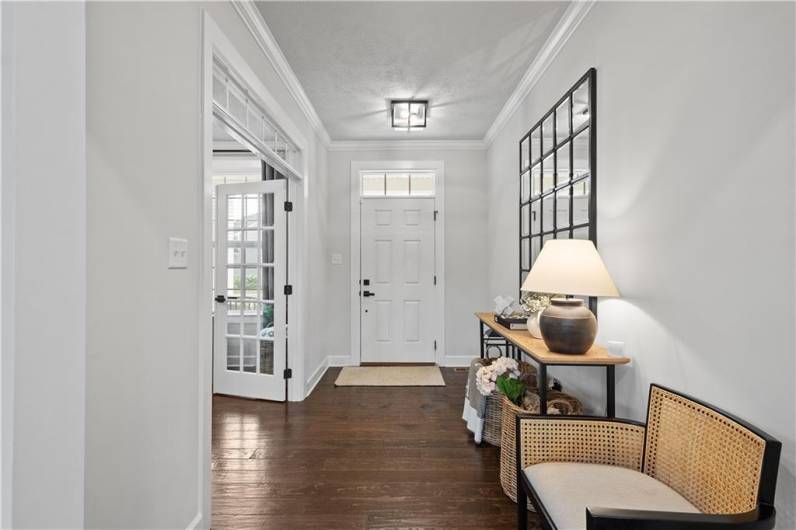 Welcoming entry with hardwood floors throughout.