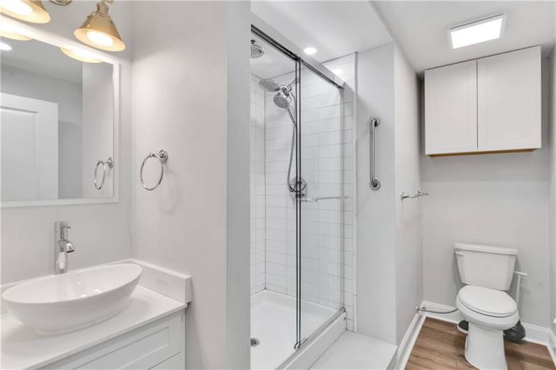 Full, bright bathroom in lower level.