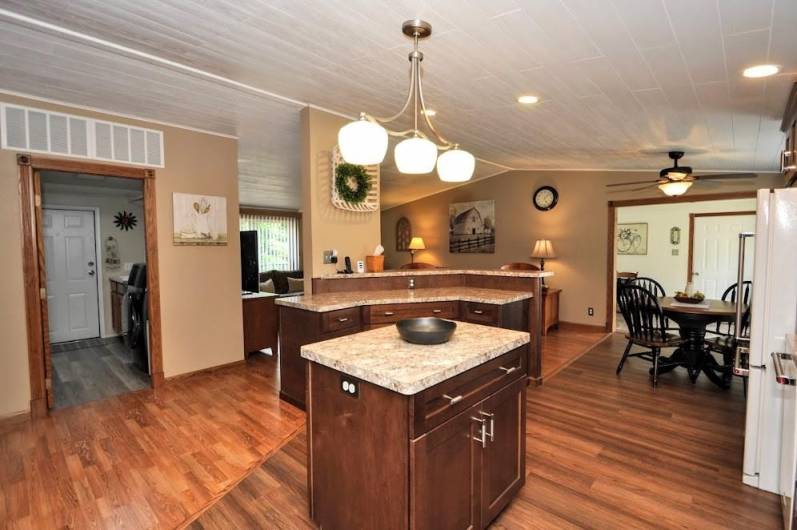 Did you see this island, too?  What an amazing floor plan. Vaulted ceiling, all the rooms have bee redrywalled and painted.  Nothing, nothing, but moving.