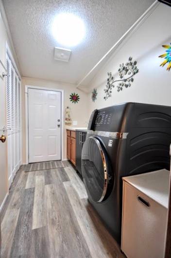 Here is the laundry room with a door to the deck.