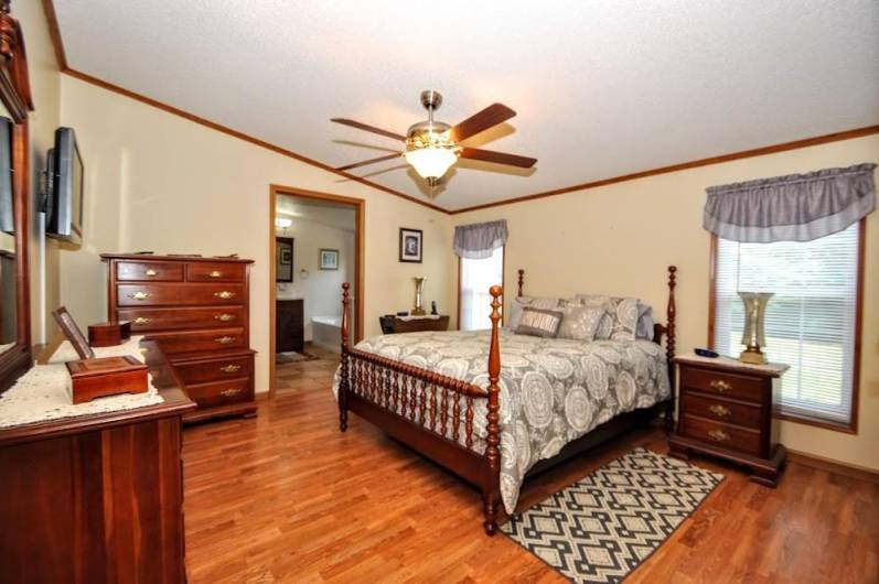 Here is the master suite.  Again, the owners installed new drywall, floors, ceiling fan.