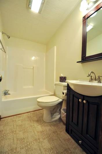 Here is the 2nd bathroom, conveniently located between the 2 bedrooms.