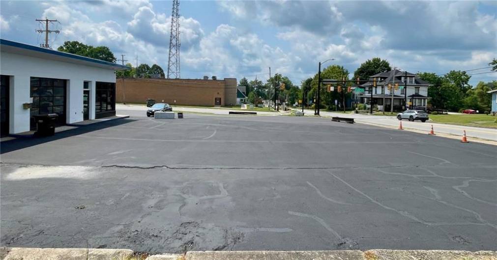 Recent partial paving and sealing of lot.