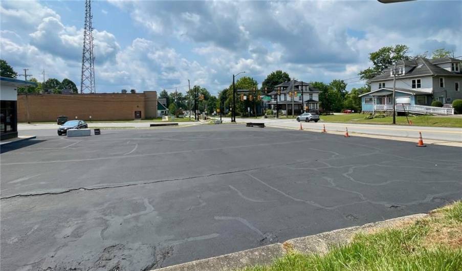 Recent partial paving and sealing of lot.