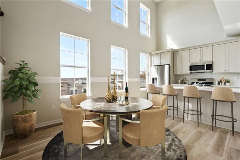 Sunshine pours into thekitchen and dining area.