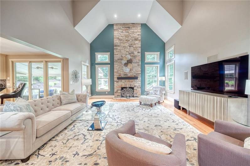 Great Room - Stunning great room. The soaring ceiling and stone fireplace that truly steals the show!