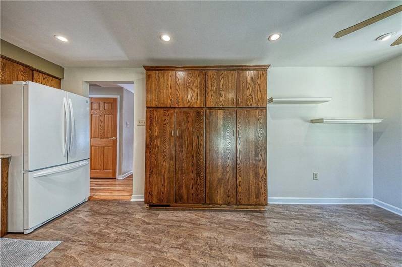 Please notice the Large Refrigerator with lower freezer as well as the double wide panytry.