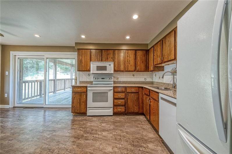 Please notice the attractive backsplash as well as granite countertops.