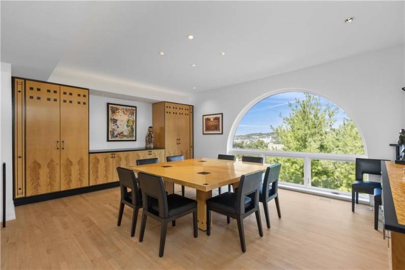 Gorgeous dining area with custom cabinetry and woodwork