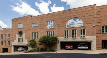 Welcome to 211-215 N. Woodland Road, a very unique property in the heart of the city