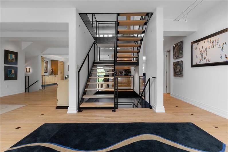 Stairs to the main level.  there is elevator access as well
