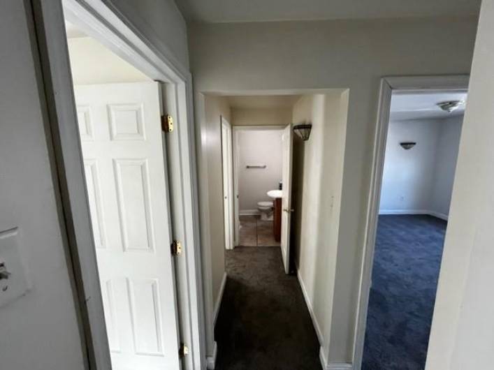 The upstairs hallway looking into the bathroom and the doors to the bedrooms.  This gives an idea of the spaciousness of the upstairs.
