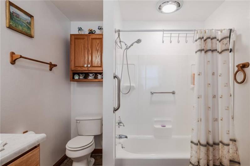 Main level full bathroom & laundry room