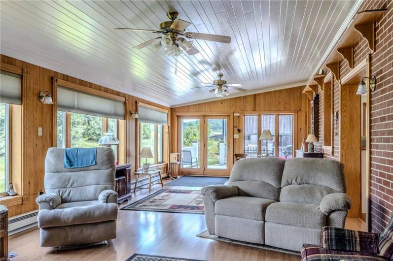 Light and bright family room/TV room... Walls of windows
