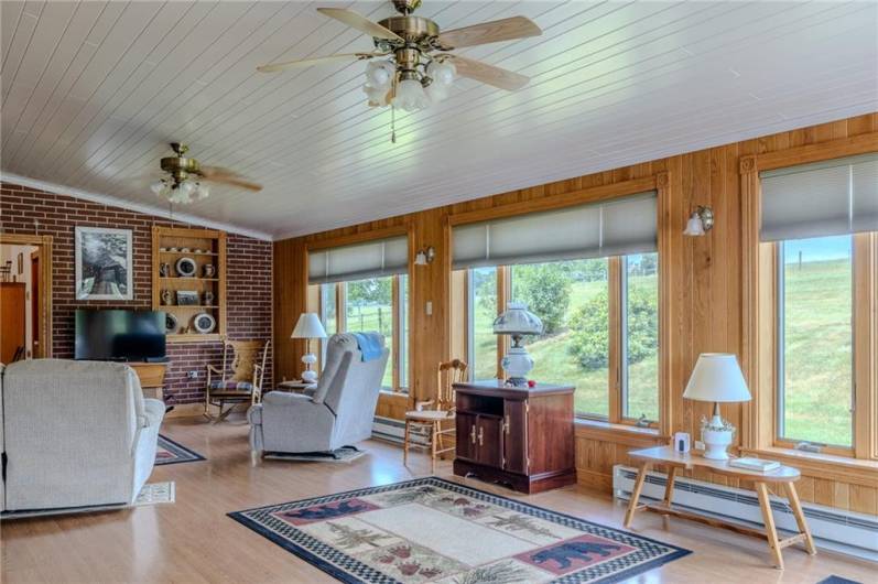 Light and bright family room/TV room... Walls of windows