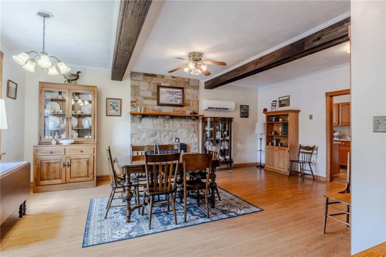 Main level Dining room - HUGE, wood beams and fireplace