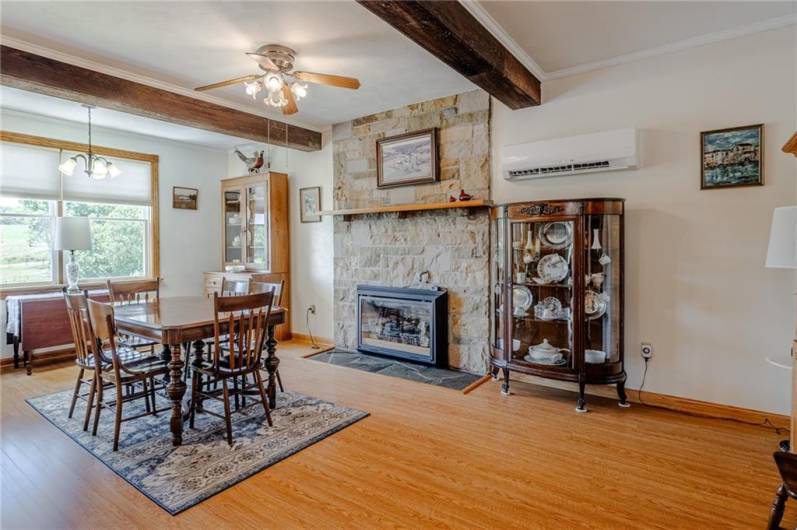 Main level Dining room - HUGE, wood beams and fireplace