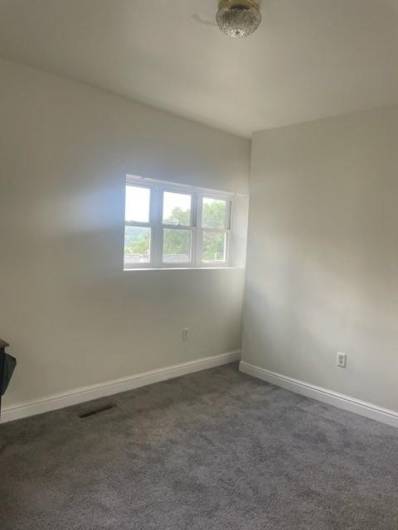 Alternate view of main floor flex space bedroom or living room