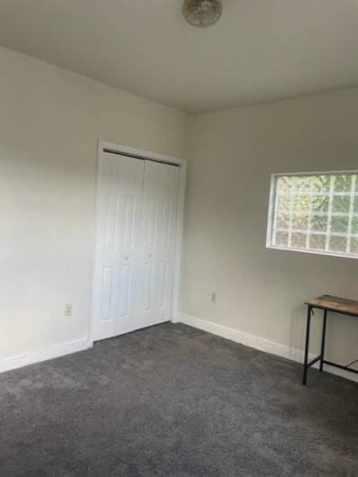 Another view of the flex space living room/bedroom on the main.