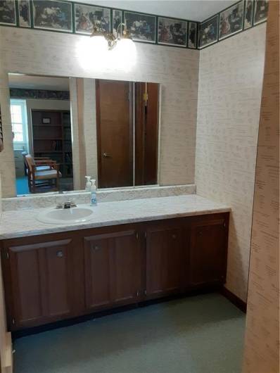 large office's full bathroom on 3rd floor