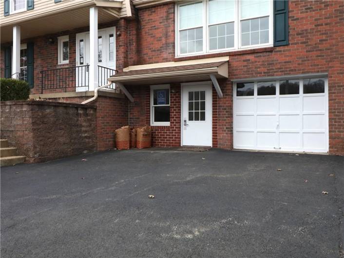 ADA compatible entrance off of paring lot