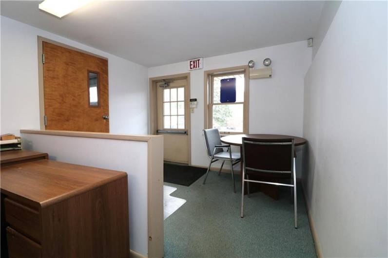 ADA compatible entrance off of paring lot interior