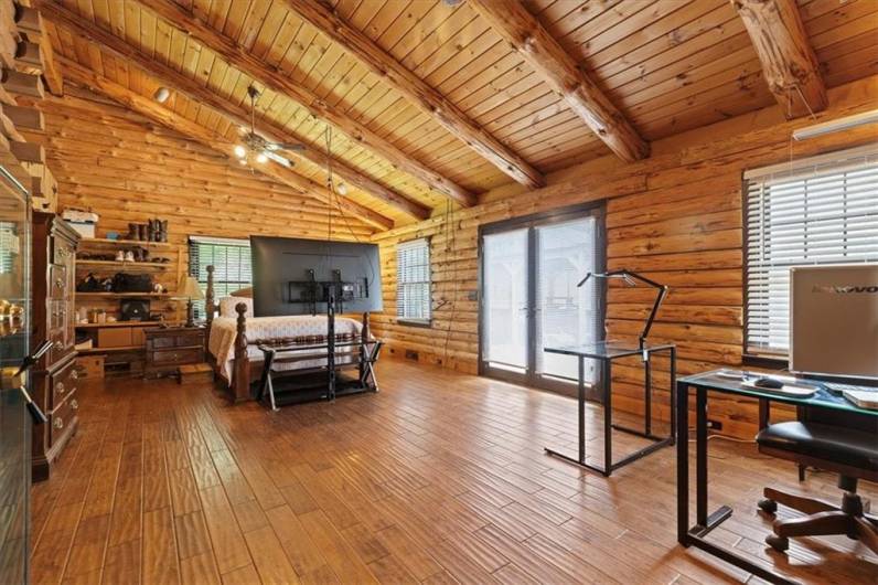 First Floor Primary Bedroom is 32x15 w/access to back deck.