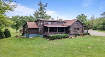 Well-loved and maintained log home.
