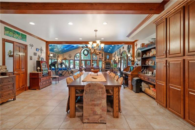 Large Dining Room with Custom Table and Chairs that will convey to new owner