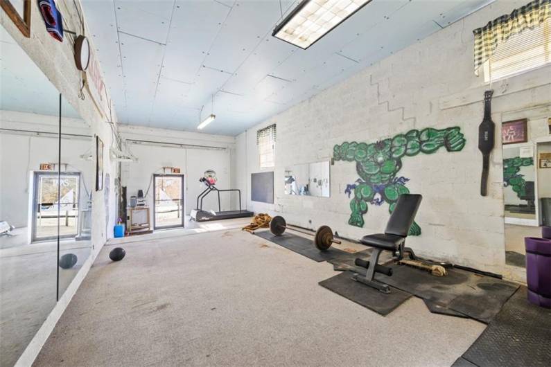 Alternate view of the converted loading dock. On the far wall is a man door where the garage door once was.