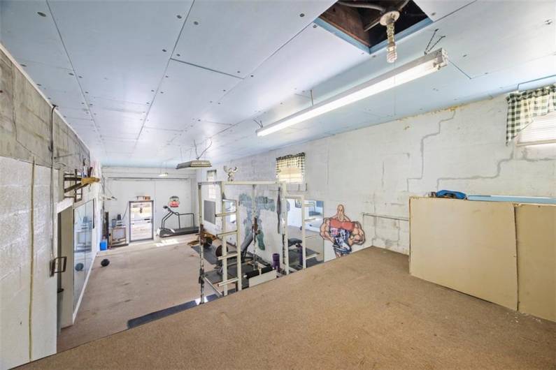 The platform area of previous loading dock in lower level of commercial space. It is 14'x9'.