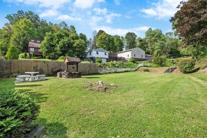 he back yard of the properties. The property is just under 1 acre.