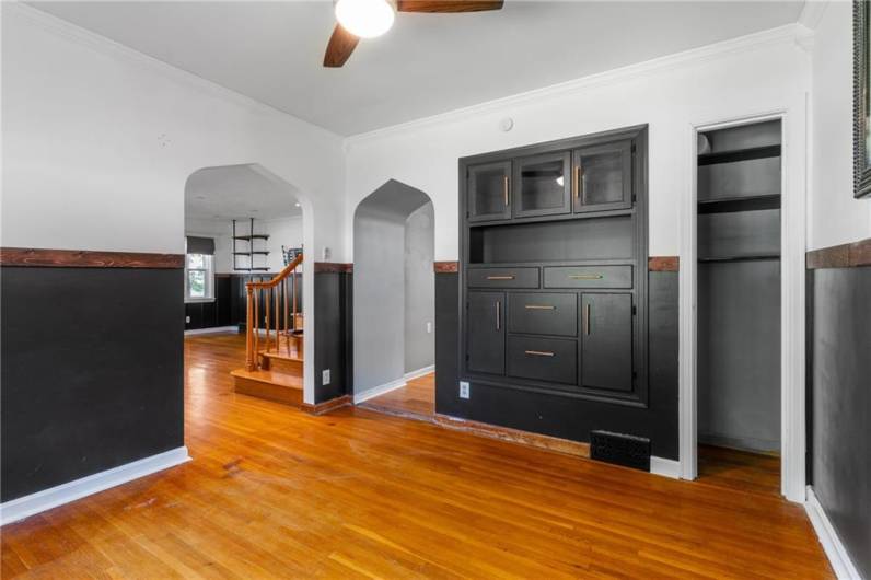 Next to the living room, you'll find a dining room complete with gorgeous built-ins and amazing architectural details.