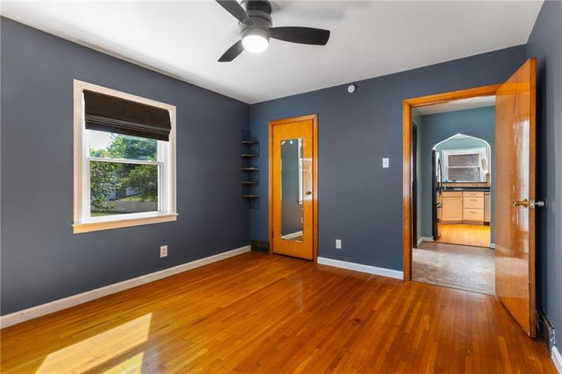 Complete with a closet and ceiling fan, comfort surrounds anyone who makes this first floor bedroom home.